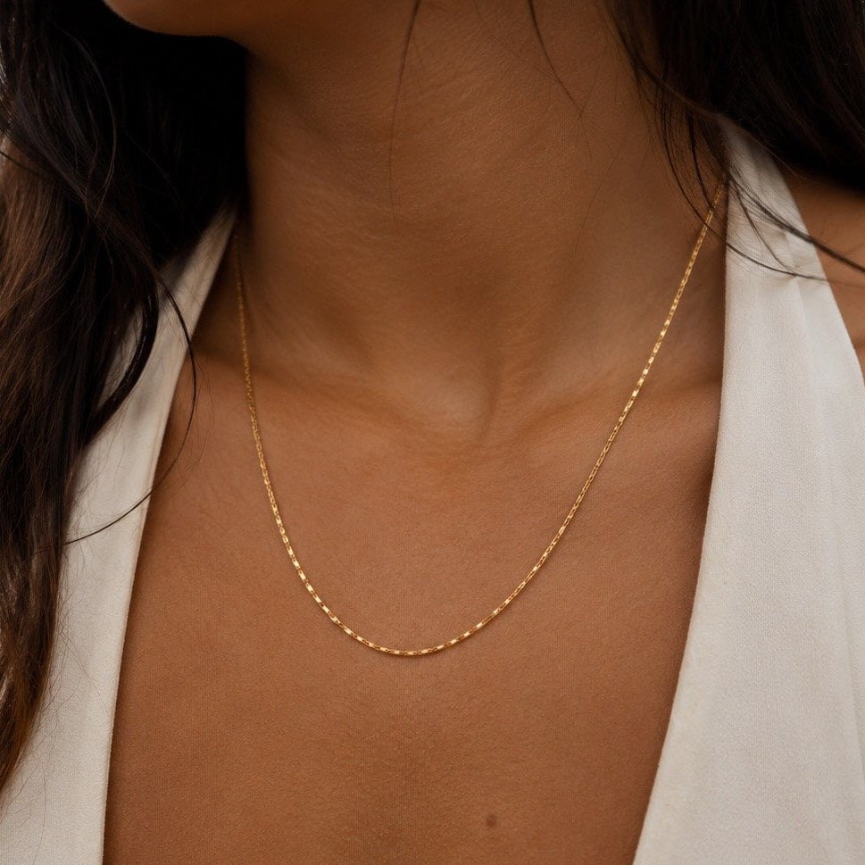 dainty gold chain necklace with a delicate minimalist design for everyday wear