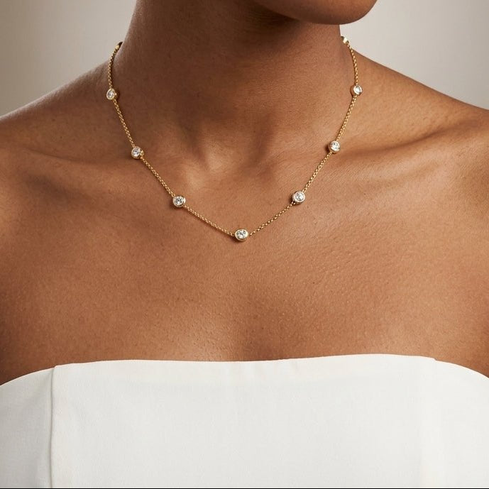clear cubic zirconia station necklace with sparkling round stones