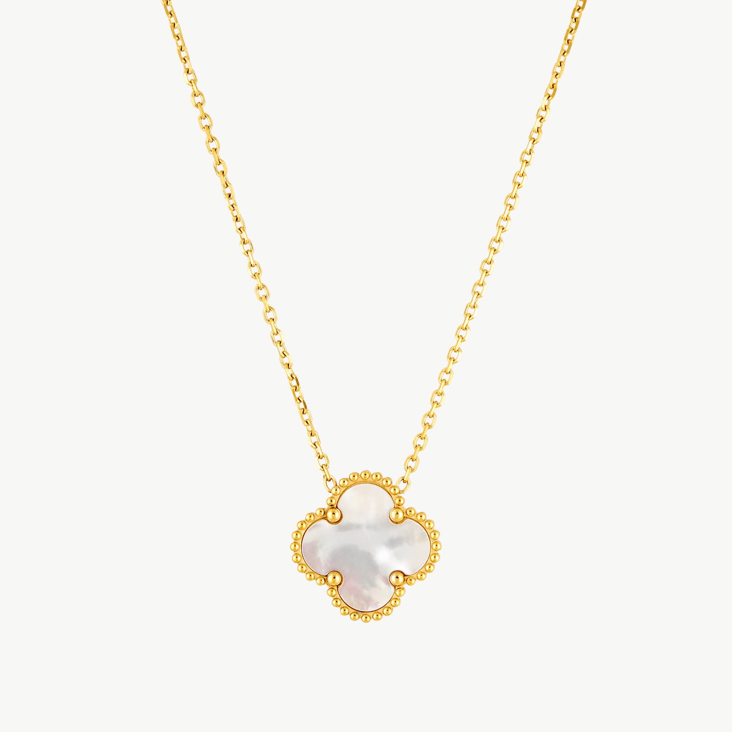 clover necklace with a mother of pearl clover pendant and gold chain