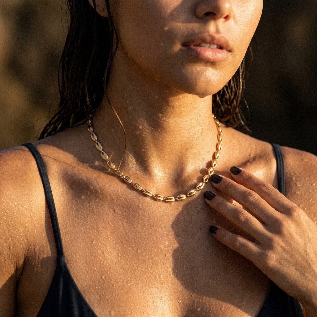 coffee bean chain necklace in gold featuring distinctive oval links