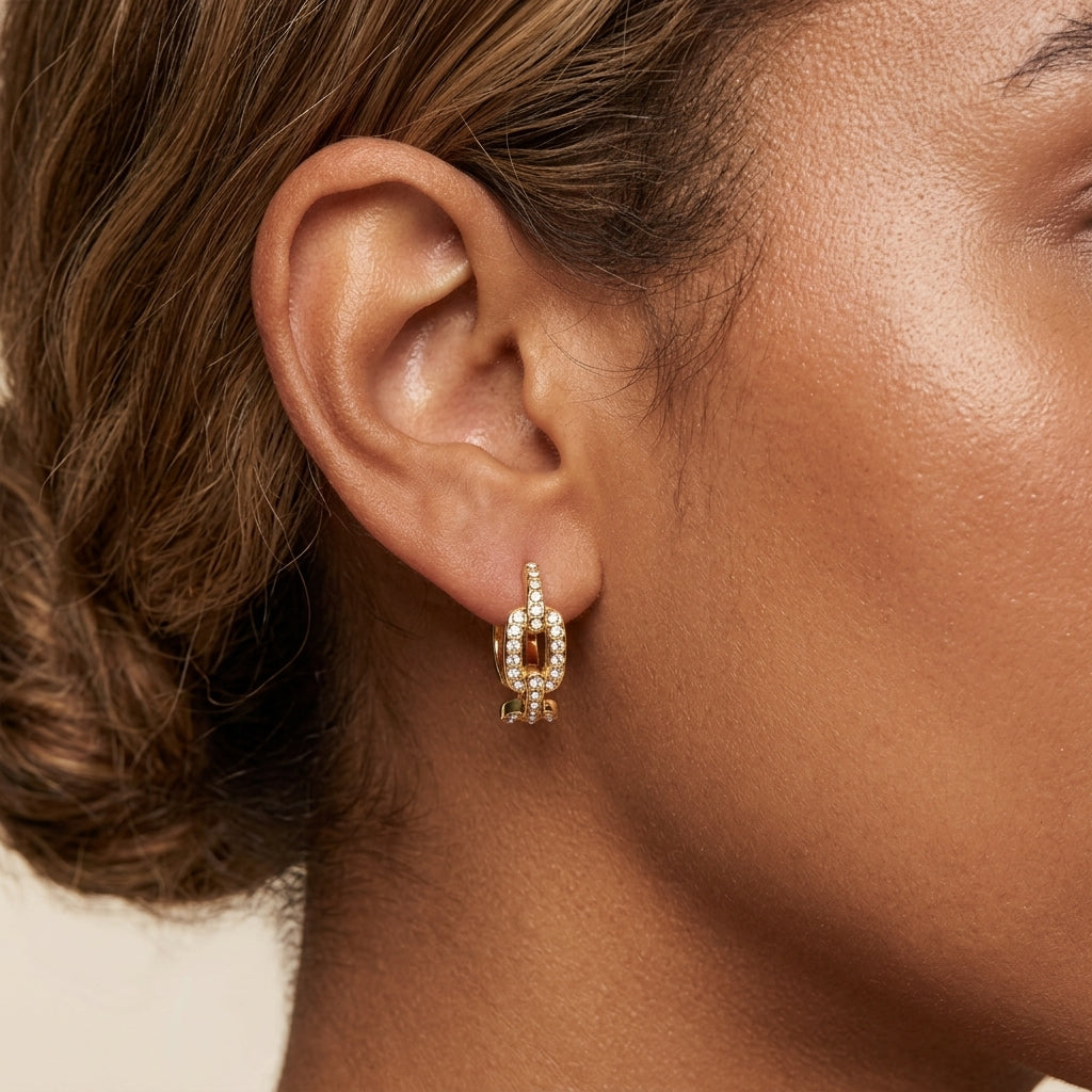 crystal link earrings with a polished gold hoop design