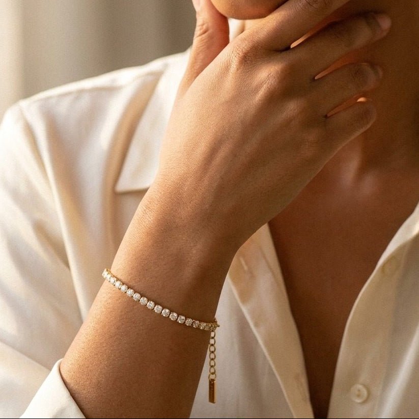 cubic zirconia tennis bracelet with sparkling round CZ stones in a delicate gold-tone setting
