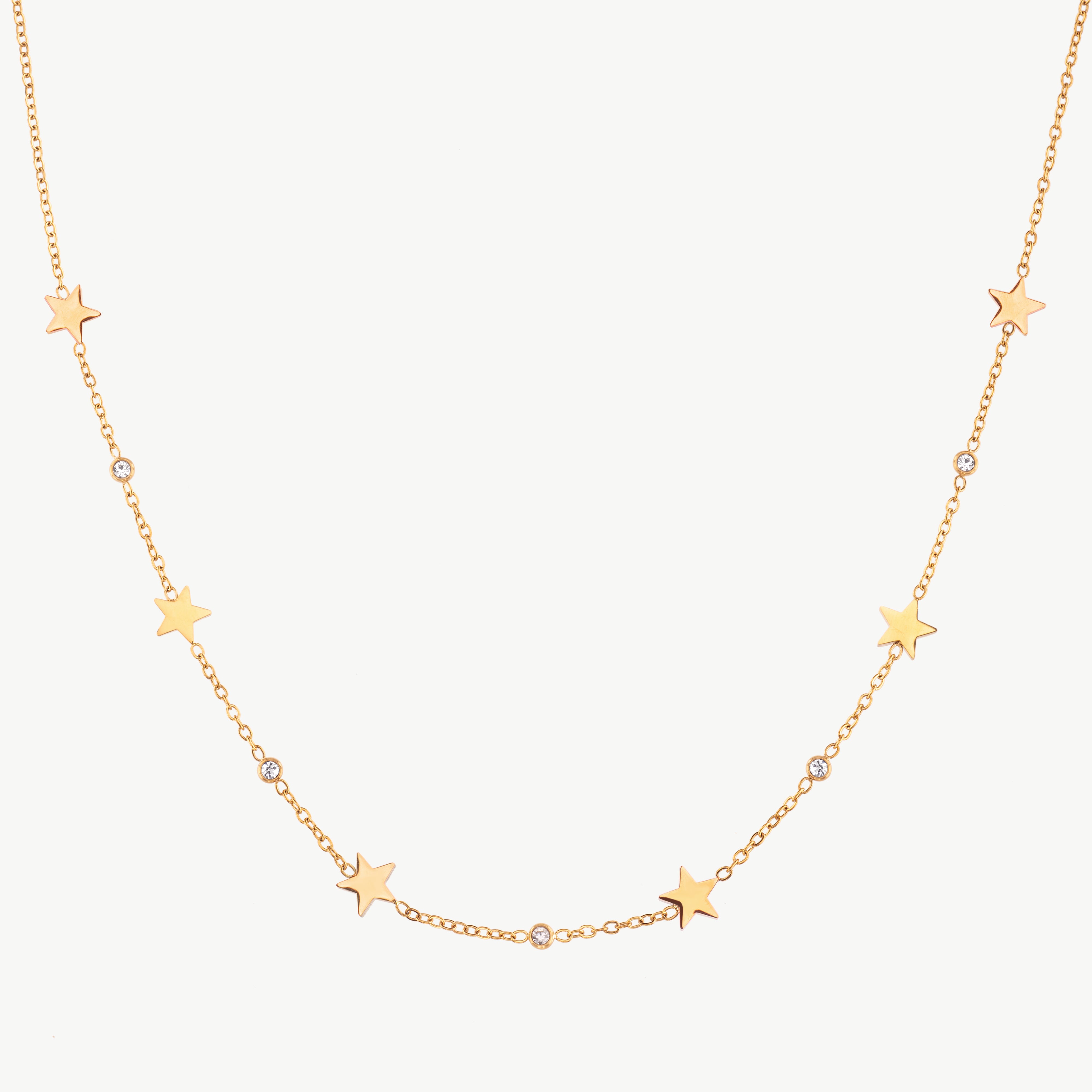 dainty star necklace in gold with small spaced star details, delicate stars necklace with fine chain and subtle celestial styling