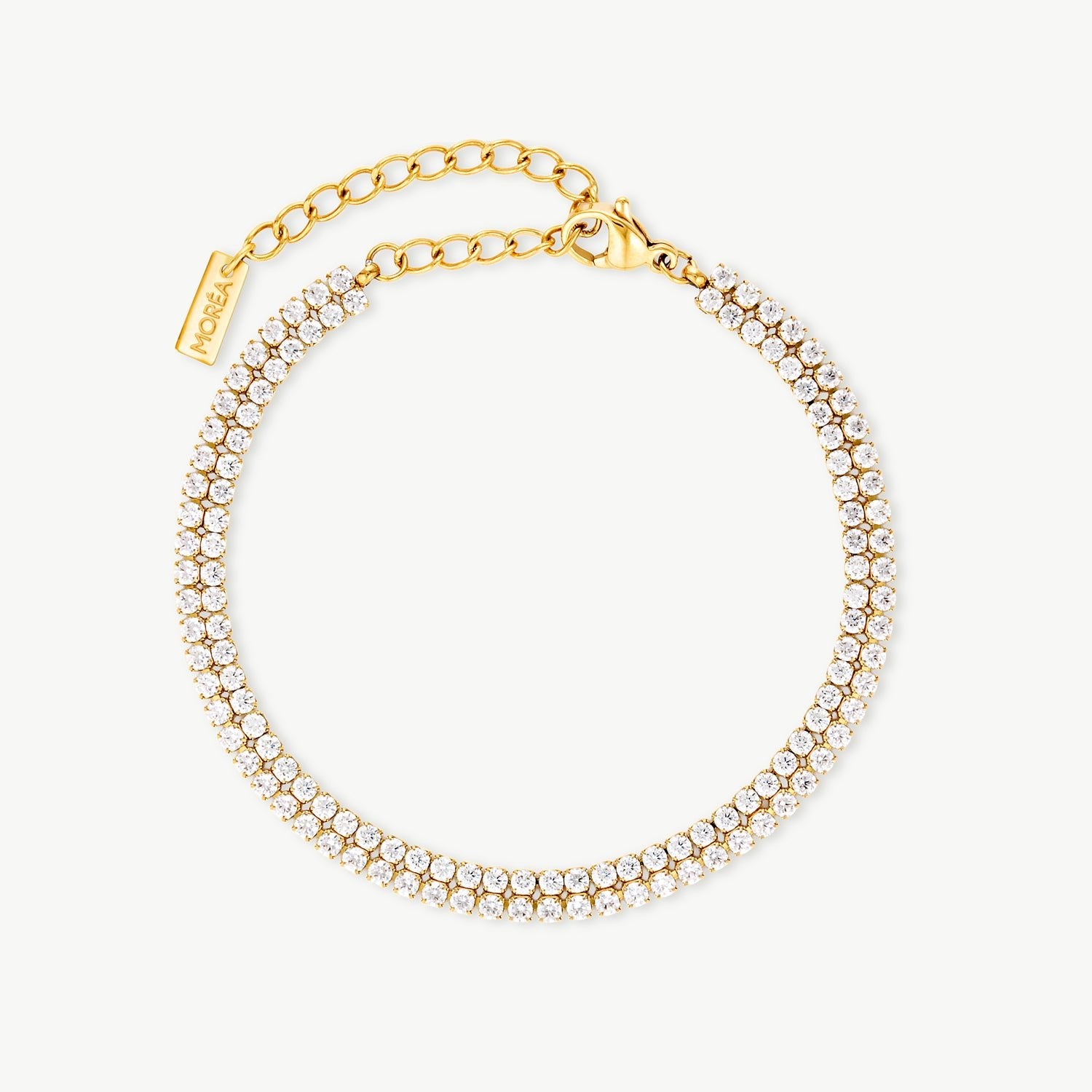 double tennis bracelet with two rows of brilliant cubic zirconia in polished gold settings