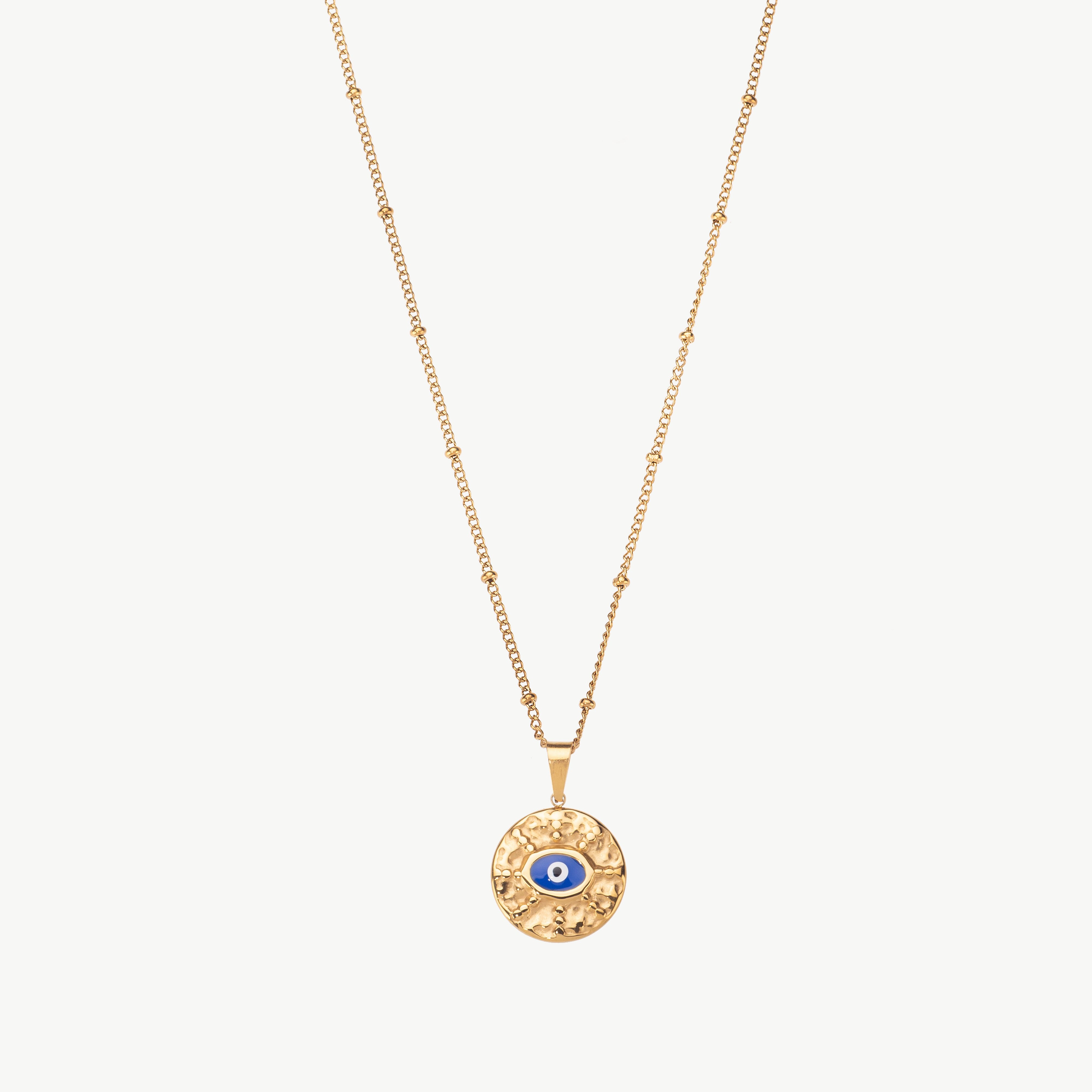 evil eye pendant necklace in gold with blue center stone, dainty evil eye charm necklace with symbolic detail and refined finish