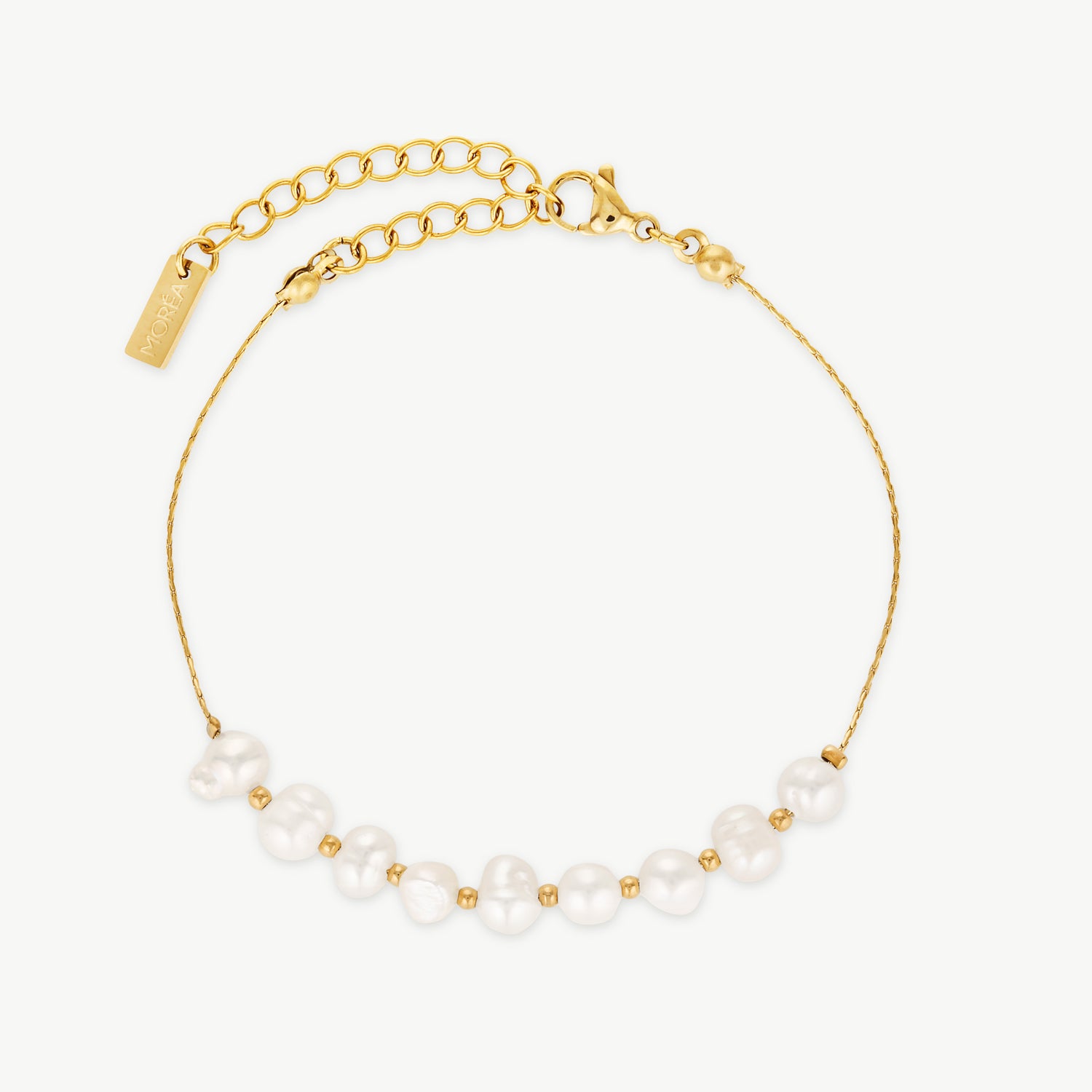 freshwater pearl and gold bracelet with luminous pearls and polished gold bead accents