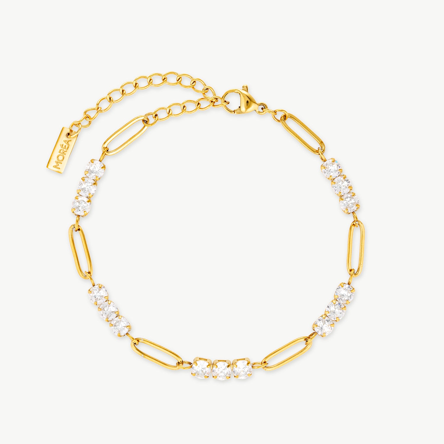 gold and crystal bracelet with elongated polished links and sparkling cubic zirconia clusters