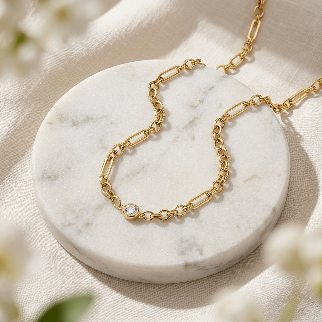 gold crystal chain necklace for women featuring a sparkling round solitaire accent and chunky gold links for modern everyday jewelry styling