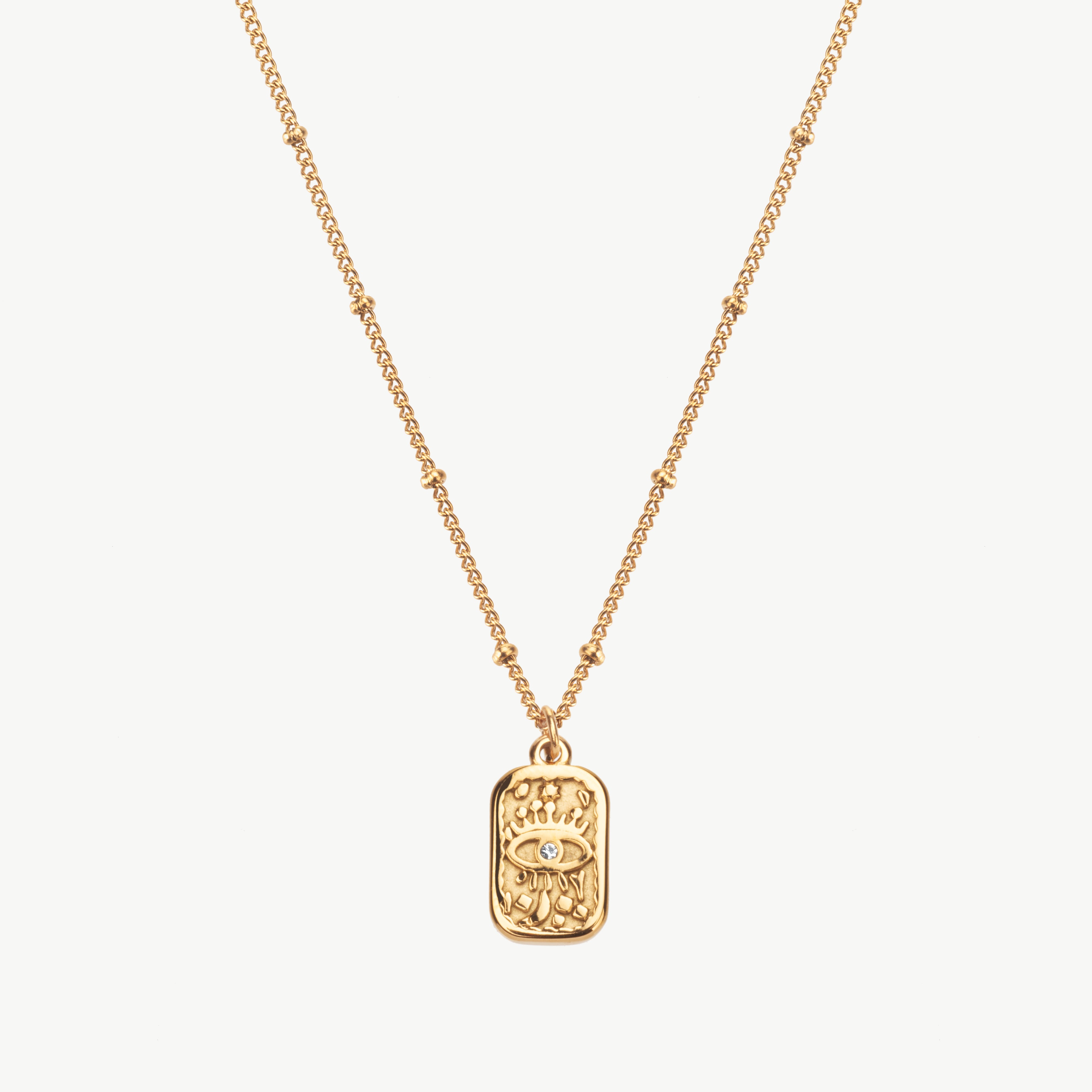 gold evil eye necklace with blue center stone, dainty evil eye charm necklace in gold with symbolic detail and refined finish