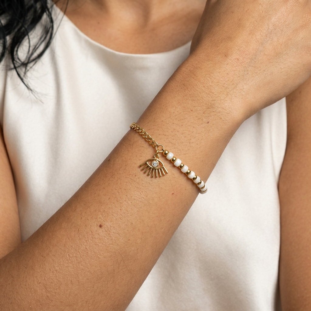 gold evil eye pearl beaded bracelet for women featuring a protective eye charm