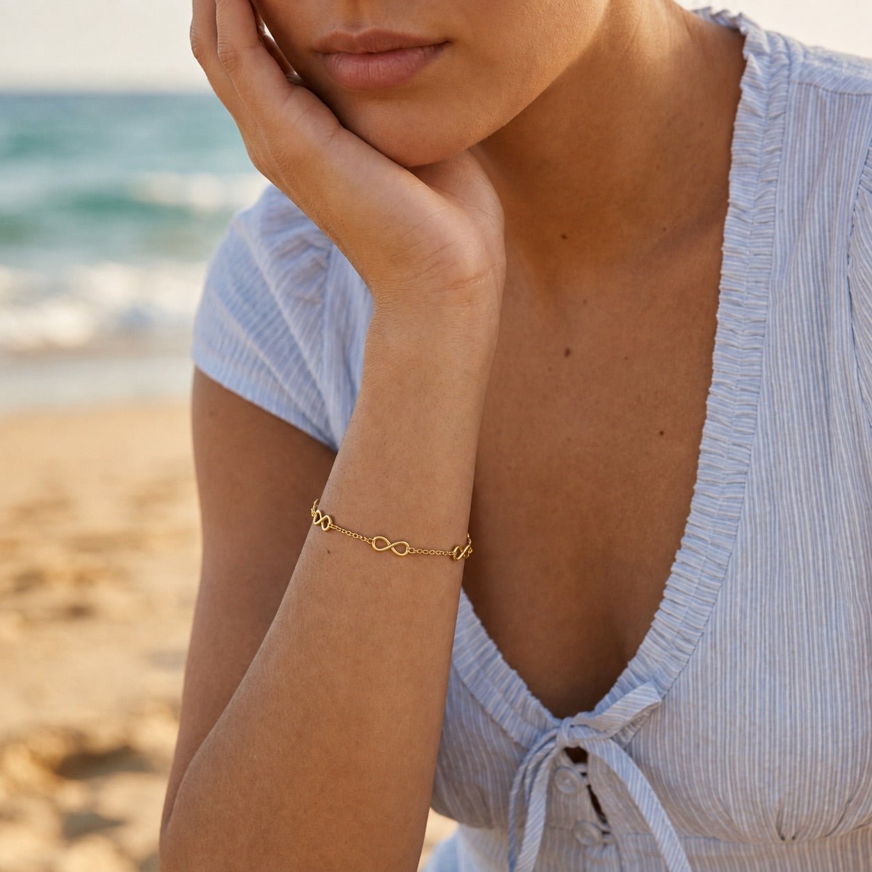 gold infinity bracelet with a delicate chain design