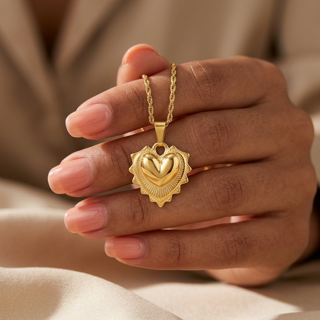 gold puffy heart necklace with a polished heart pendant