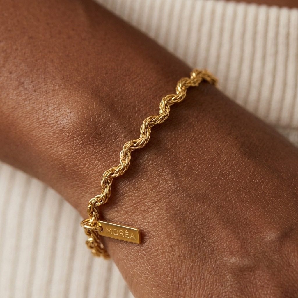 gold rope chain bracelet featuring a twisted textured design with an elegant polished finish