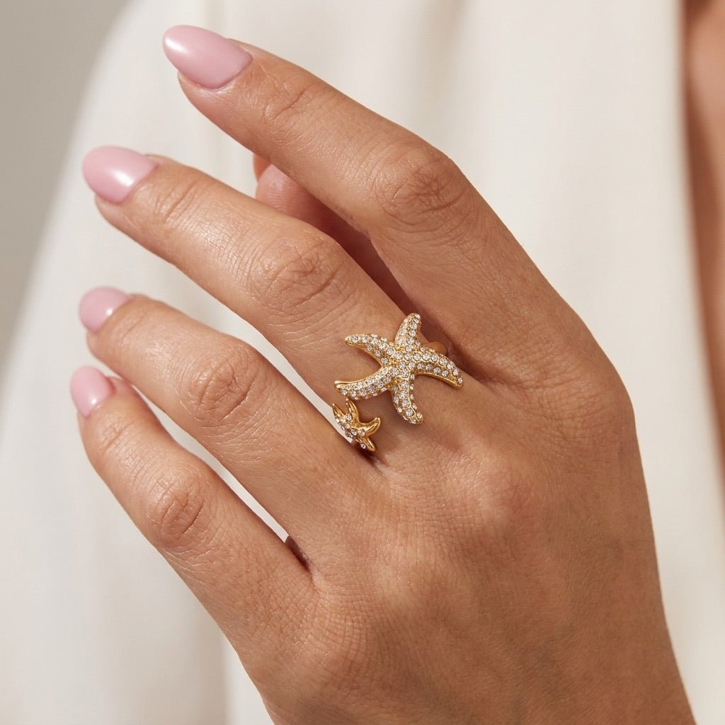 gold starfish ring with sparkling pavé stones and a bold open wraparound design