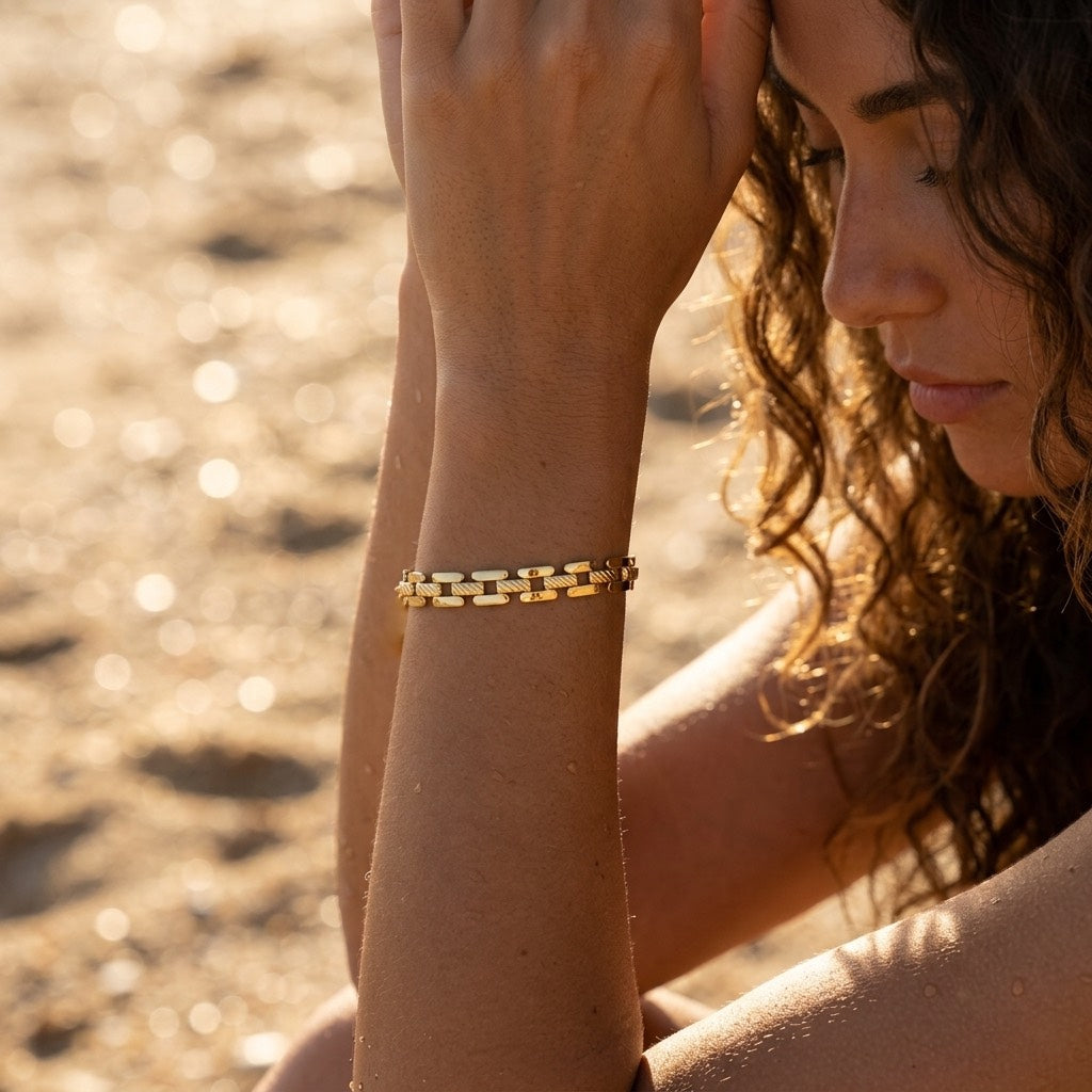 gold watch link bracelet for women featuring distinctive rectangular interlocking links with polished and textured finishes for sophisticated everyday styling