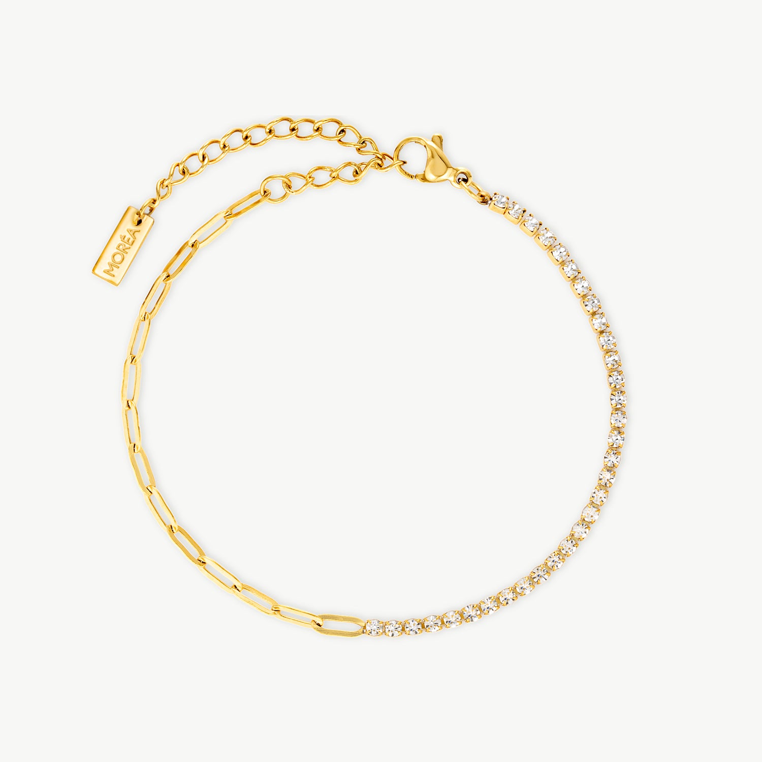 half bezel tennis bracelet with clear cubic zirconia and elongated polished gold links