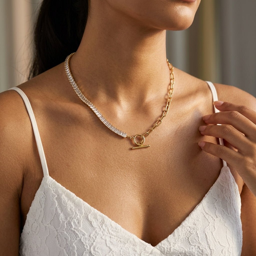 half tennis choker necklace with cubic zirconia stones, gold chain links and toggle closure