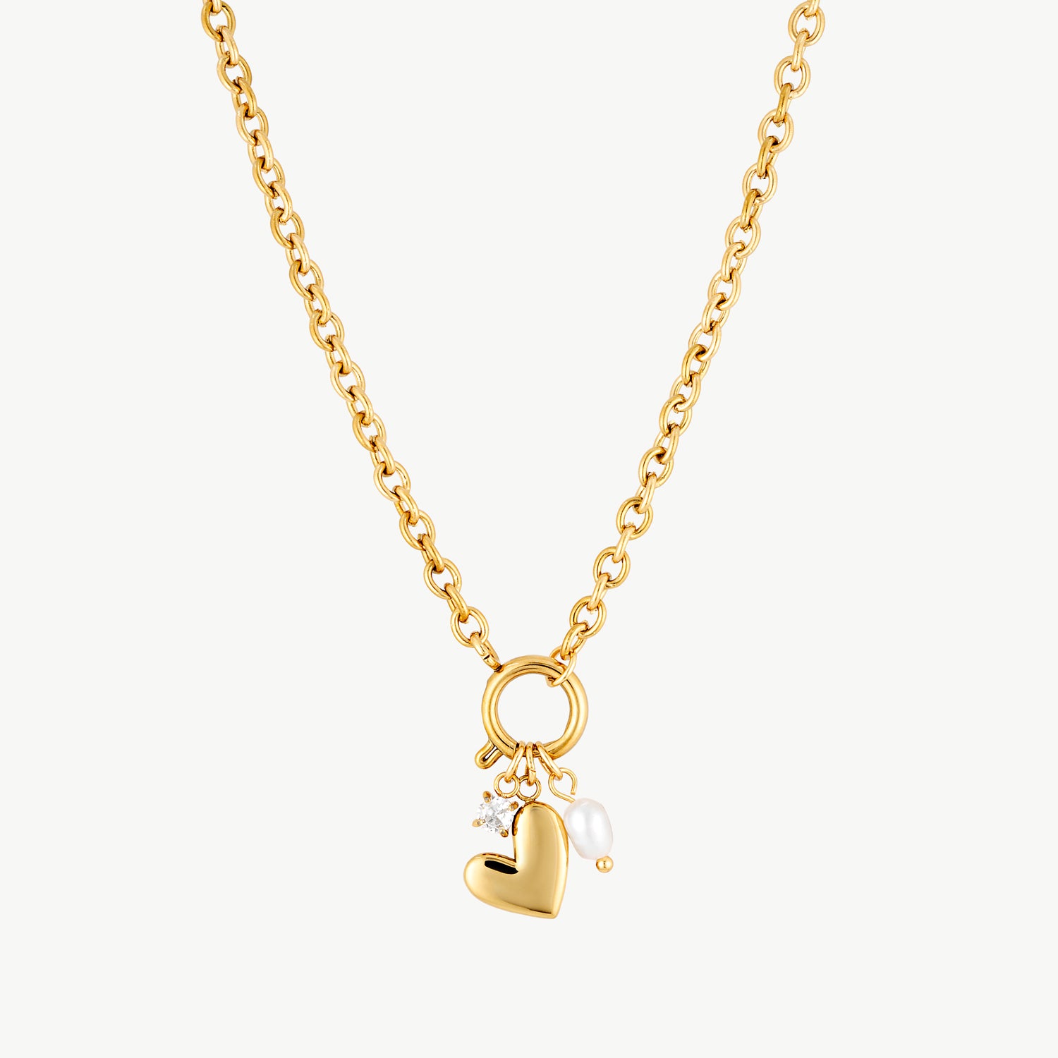 heart and pearl necklace gold chain with polished heart pendant and delicate pearl charm for elegant everyday styling