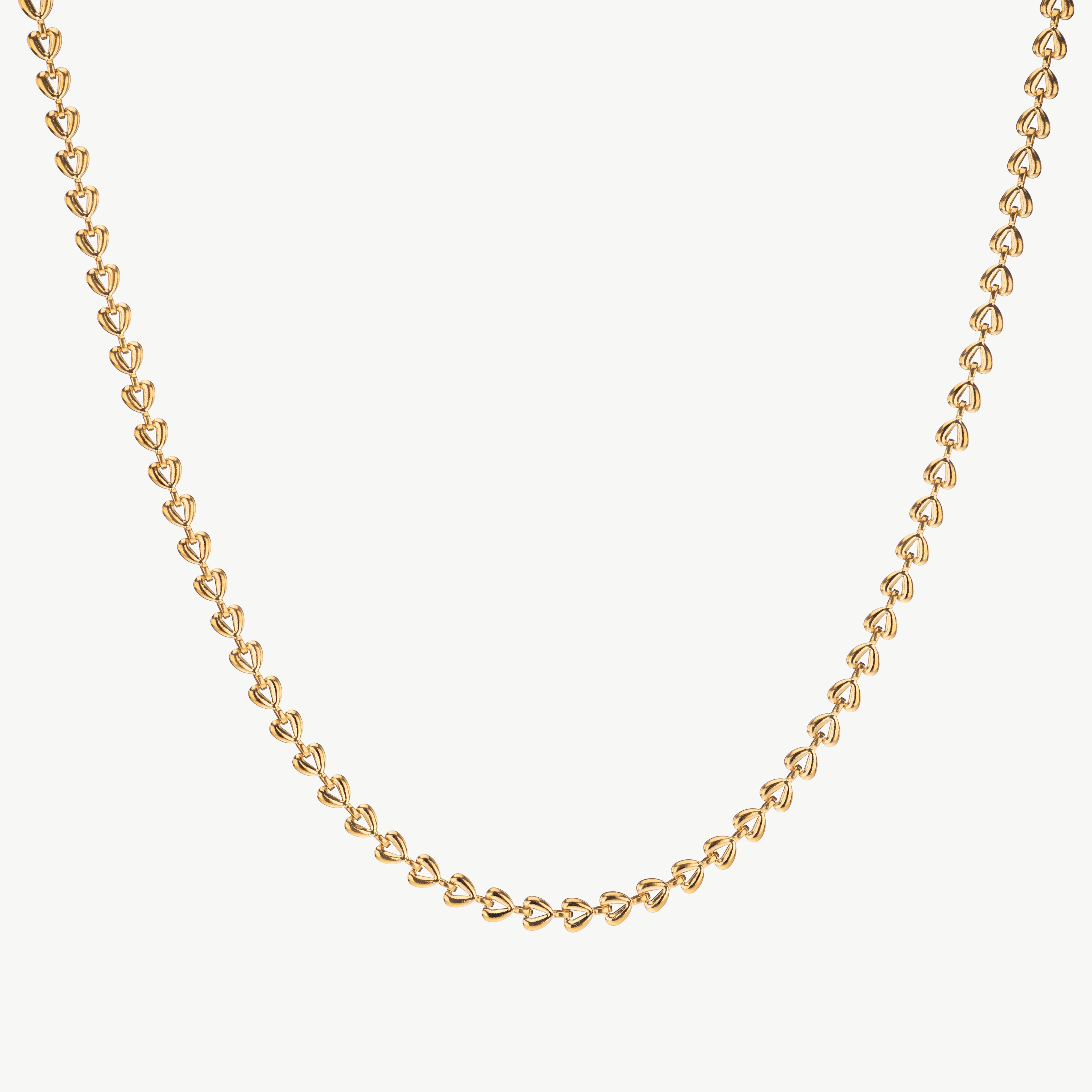 heart link chain necklace in gold with heart shaped links, gold heart chain necklace with polished finish and layering necklace design