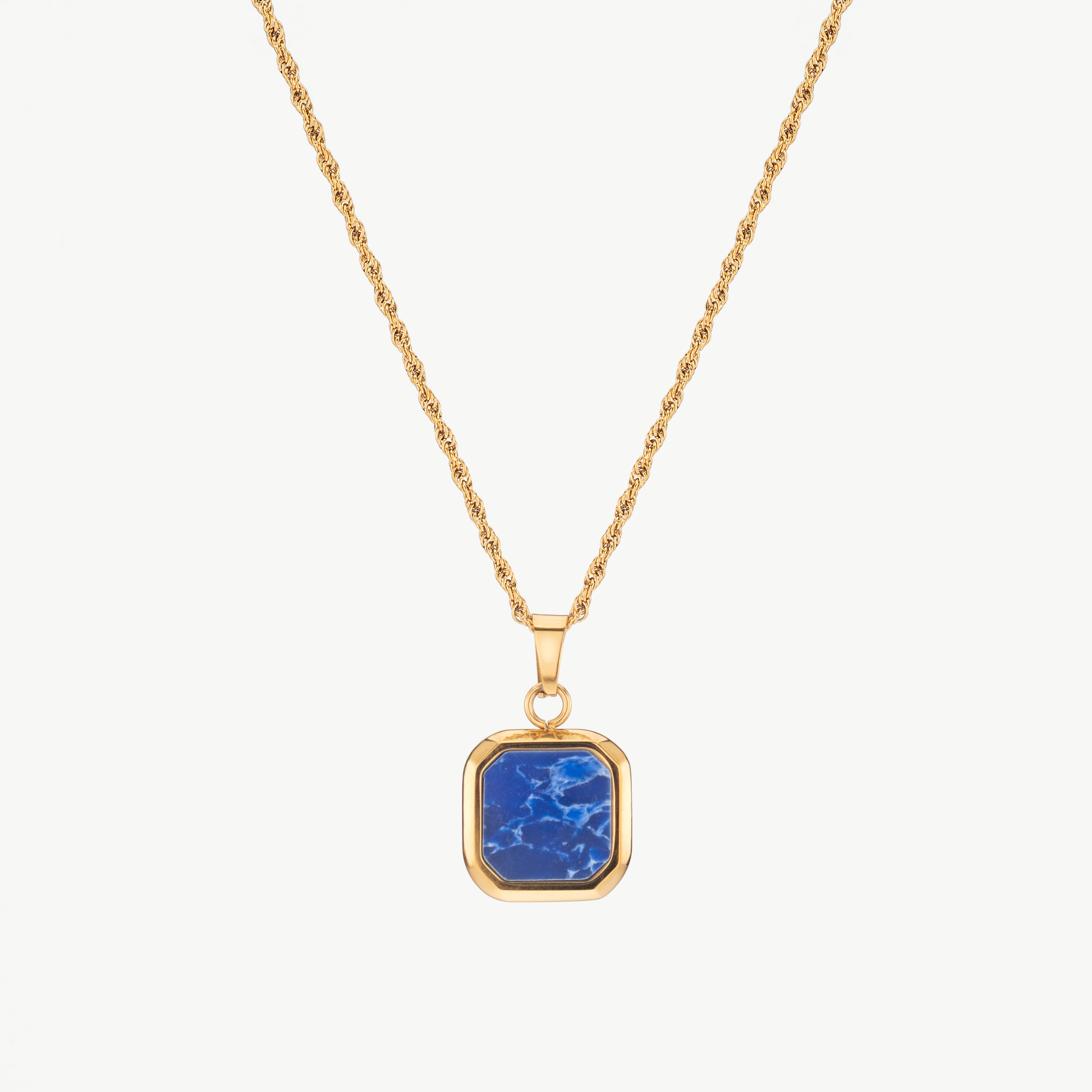 lapis lazuli necklace in gold with deep blue stone, gold lapis lazuli necklace with polished finish and rich color contrast