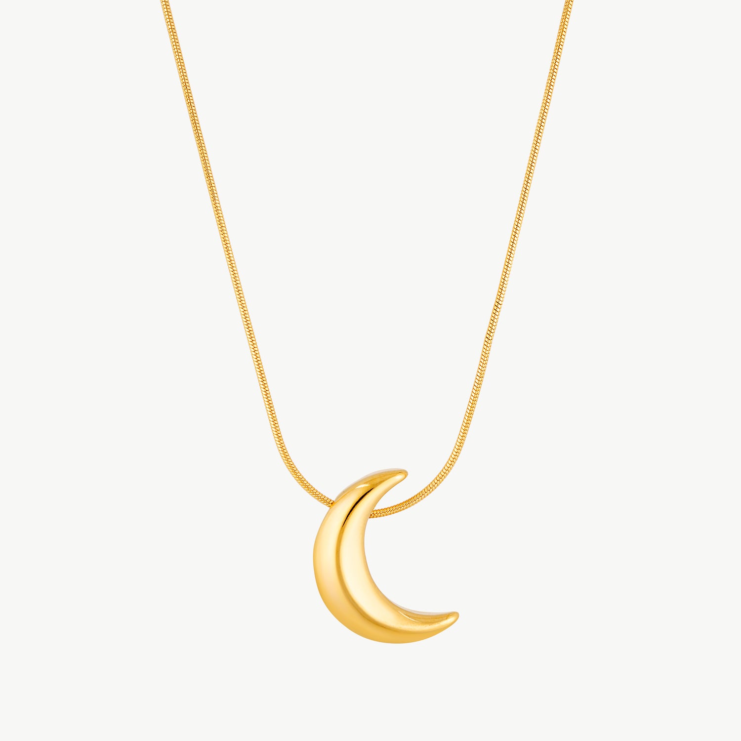 moon necklace with a polished crescent moon pendant on a waterproof gold chain