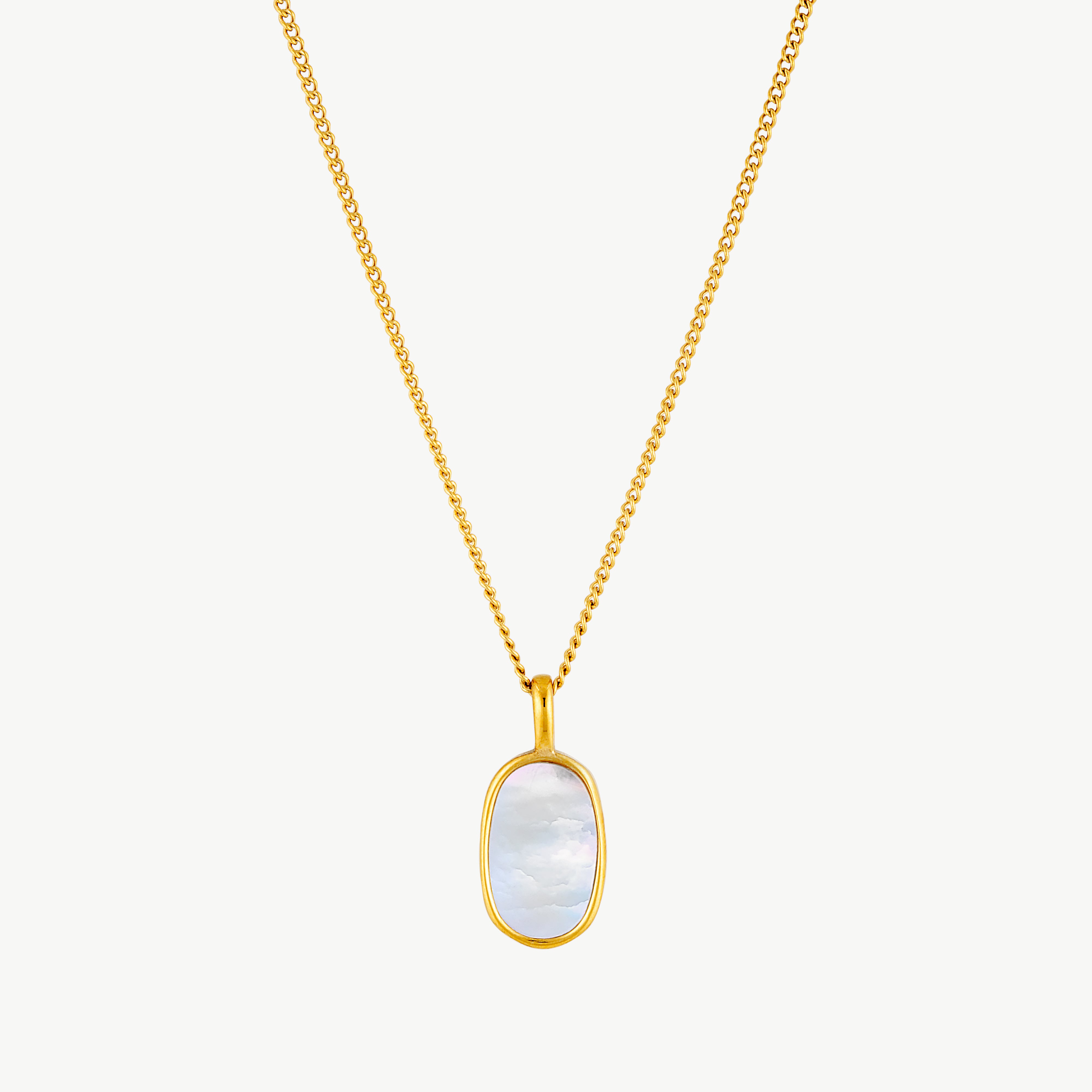 mother of pearl necklace with elongated iridescent white mother of pearl pendant framed in polished gold on a delicate chain