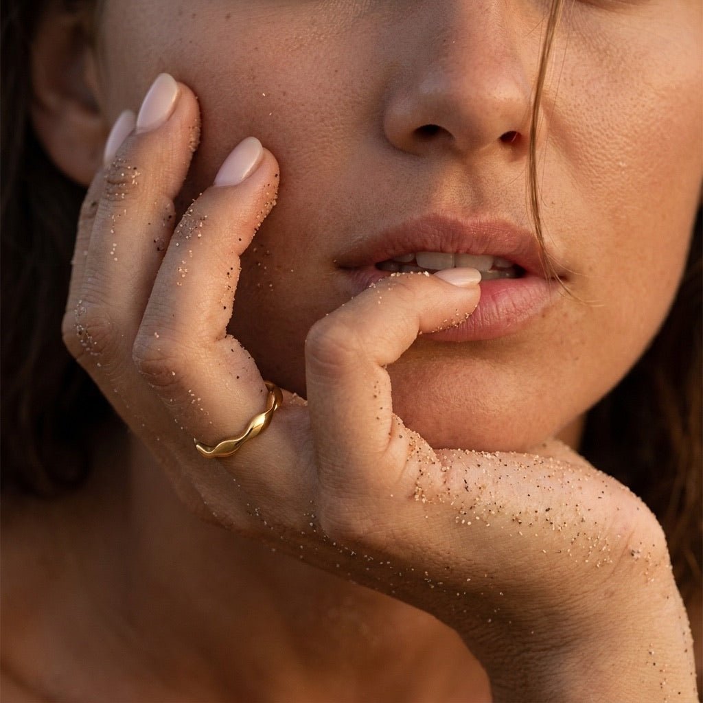 organic shape ring with a softly sculpted wave band, styled on hand