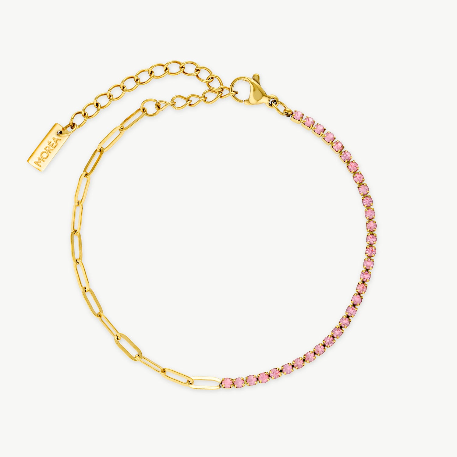 pink and gold bracelet with sparkling pink crystals and polished gold and pink paperclip tennis bracelet chain detailing inspired by luxury feminine jewelry