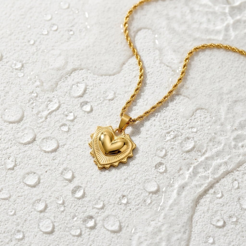 puffy heart pendant necklace with a gold chain