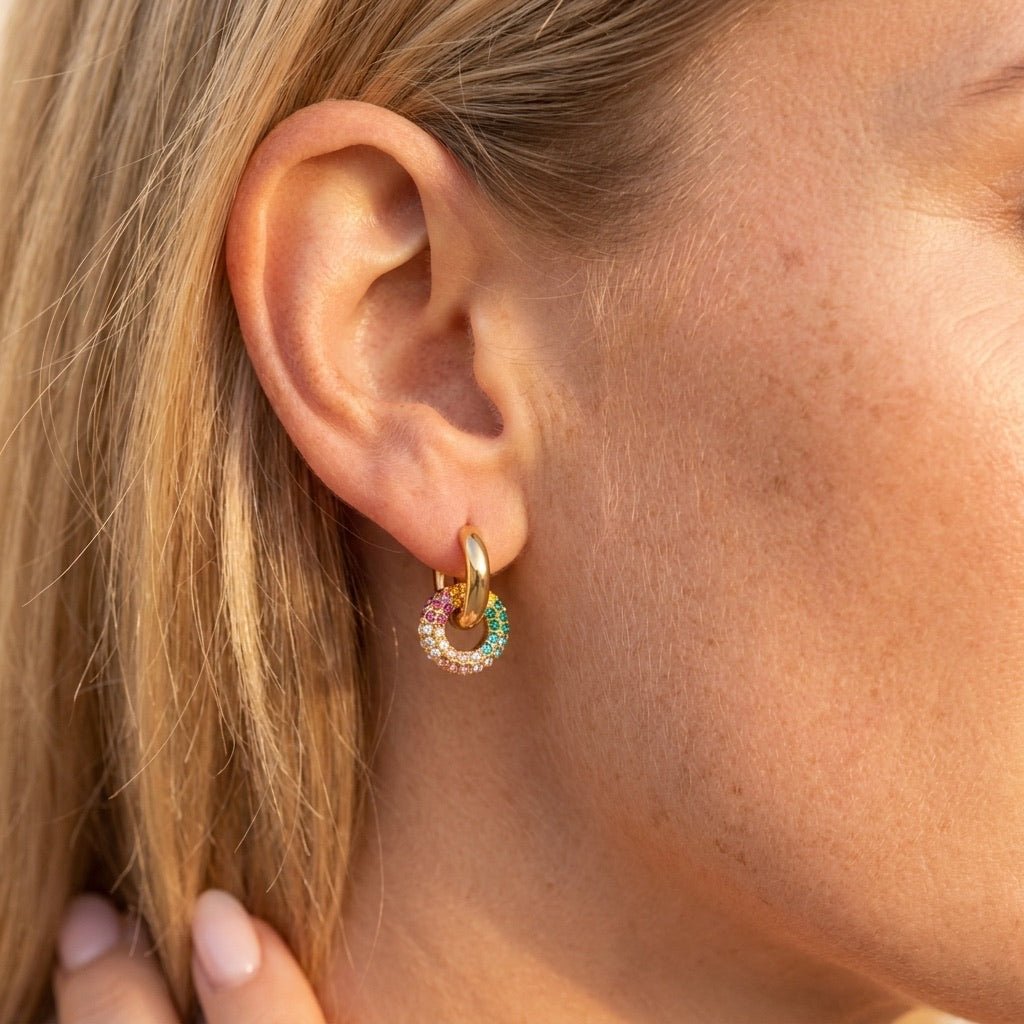 rainbow earrings for women with colorful crystals and gold hoop detailing
