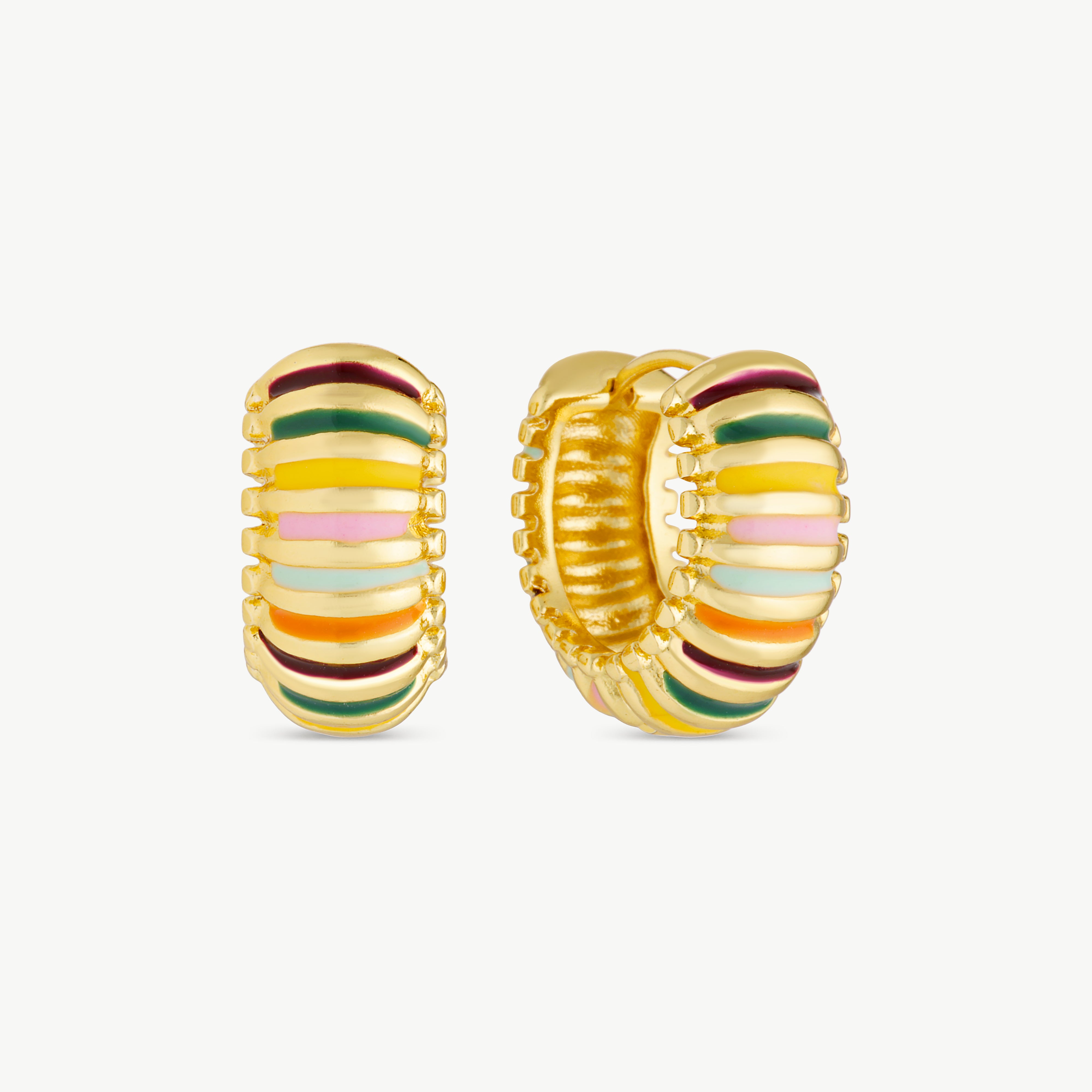 rainbow huggie earrings with multicolor enamel stripes and polished gold detailing in a chunky rounded hoop design