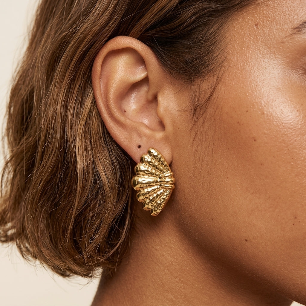 seashell earrings for women with a textured gold statement design