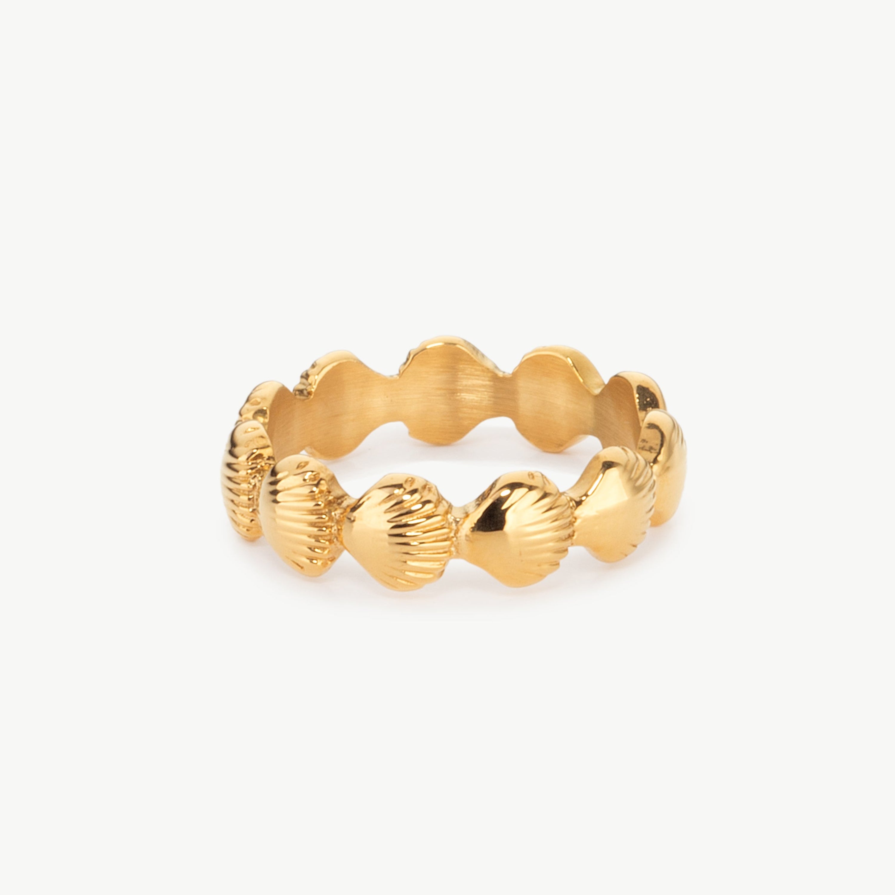 seashell ring in gold with sculpted shell shape, gold seashell ring with polished finish and ocean inspired minimalist styling
