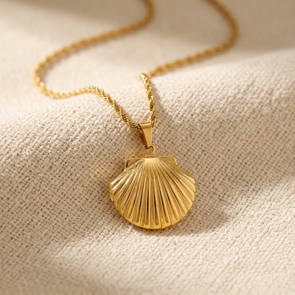 shell locket pendant necklace with a gold seashell design