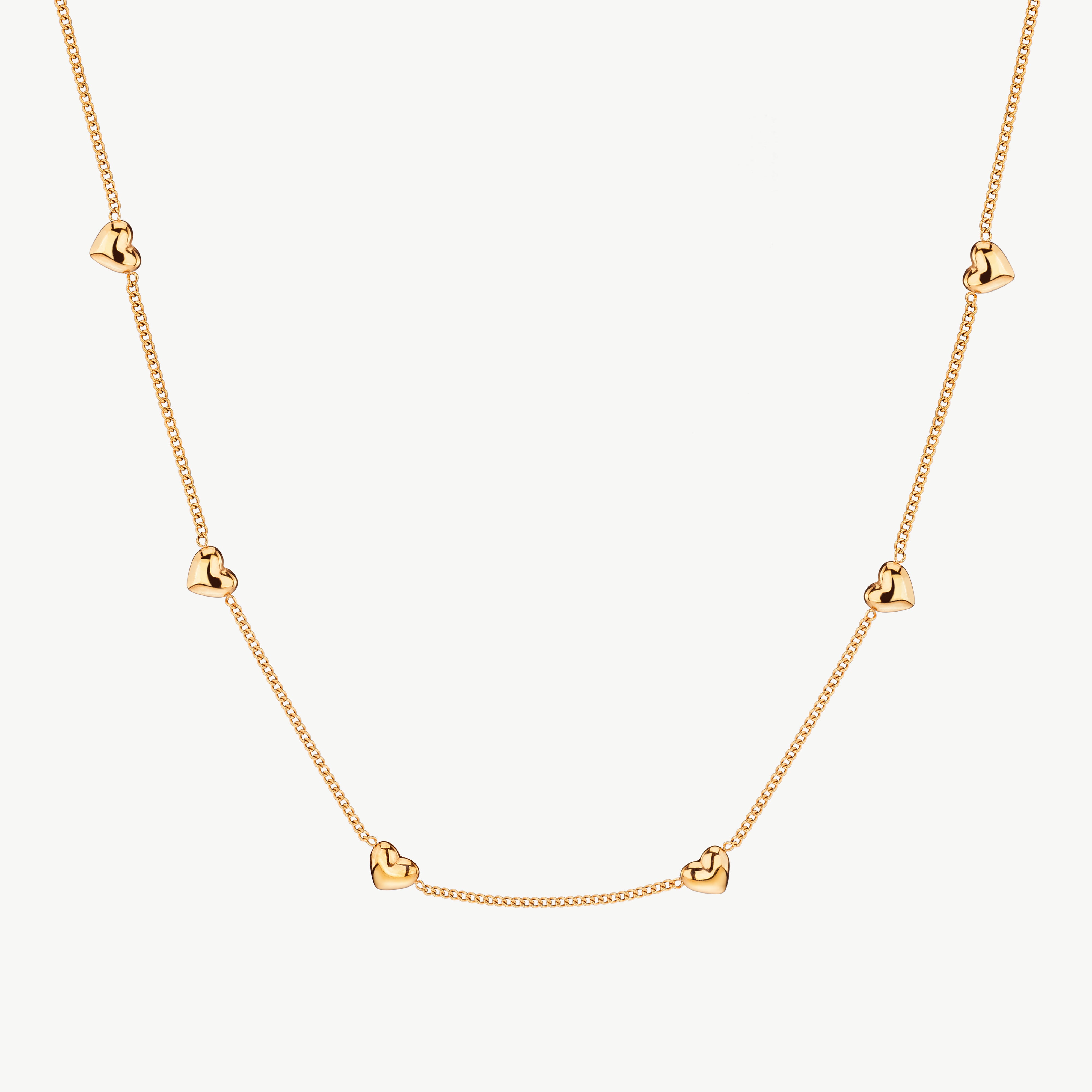 small heart necklace in gold with dainty heart charm, gold heart necklace for women with polished finish and minimal delicate styling