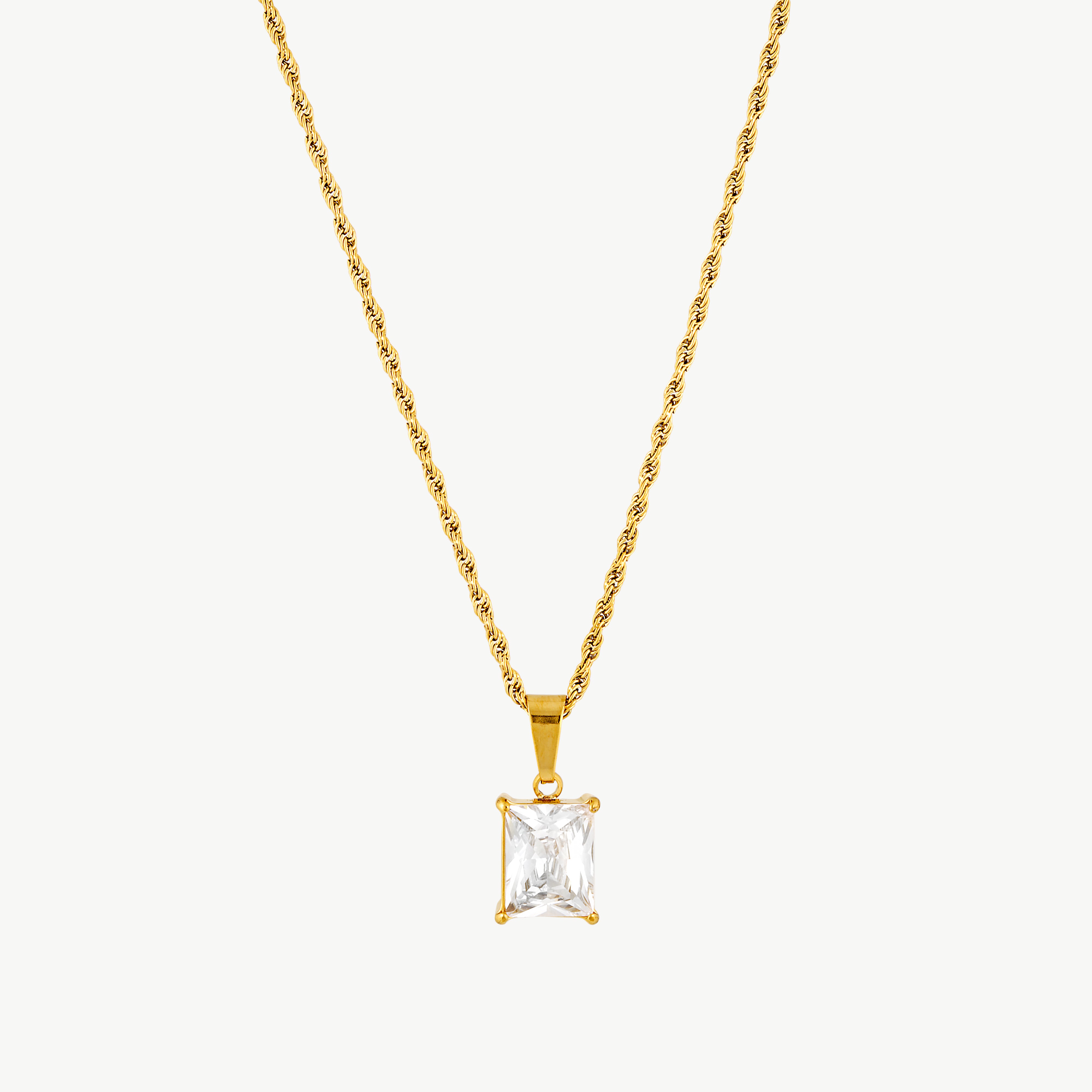 square crystal necklace with brilliant square cut cubic zirconia pendant in a polished gold setting on a textured chain