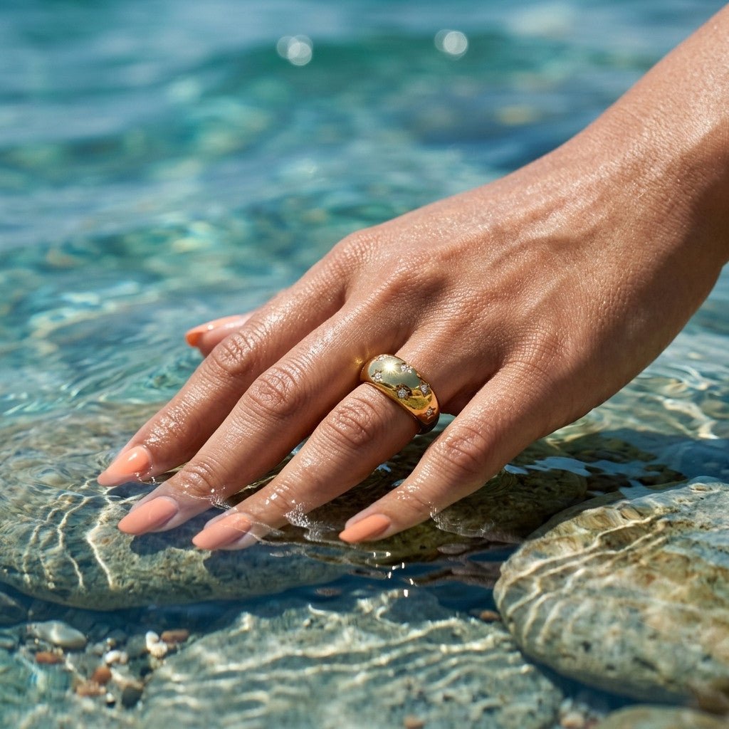 star motif gold ring with sparkling celestial accents and a smooth polished statement band