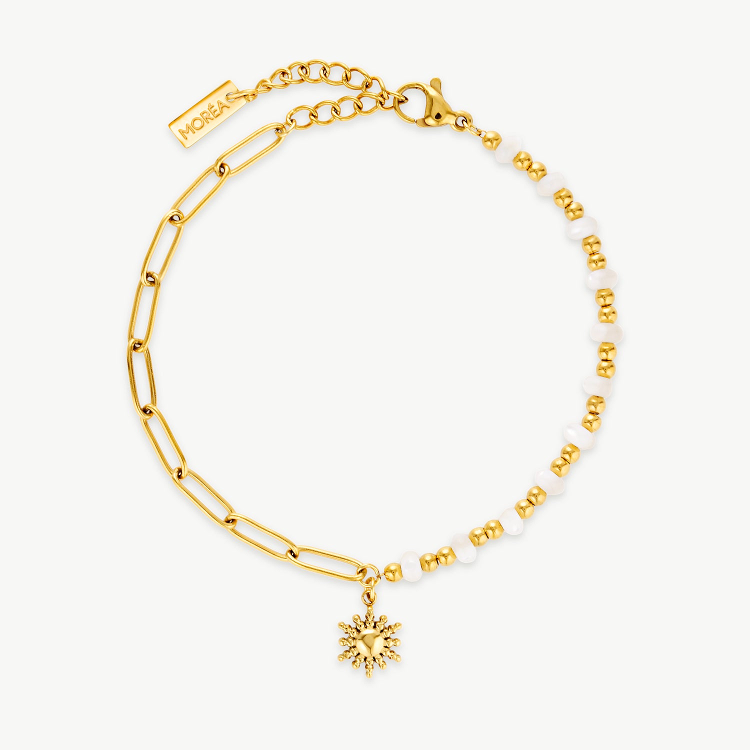 sun charm bracelet with white bead detailing and polished gold chain links creating an elegant layered beaded bracelet