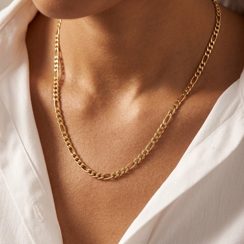 thick gold Figaro chain for women featuring a bold polished finish