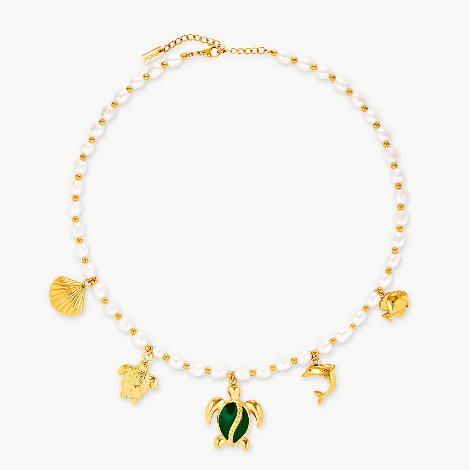 turtle necklace with pearl-inspired beads and a gold sea turtle charm on a waterproof necklace