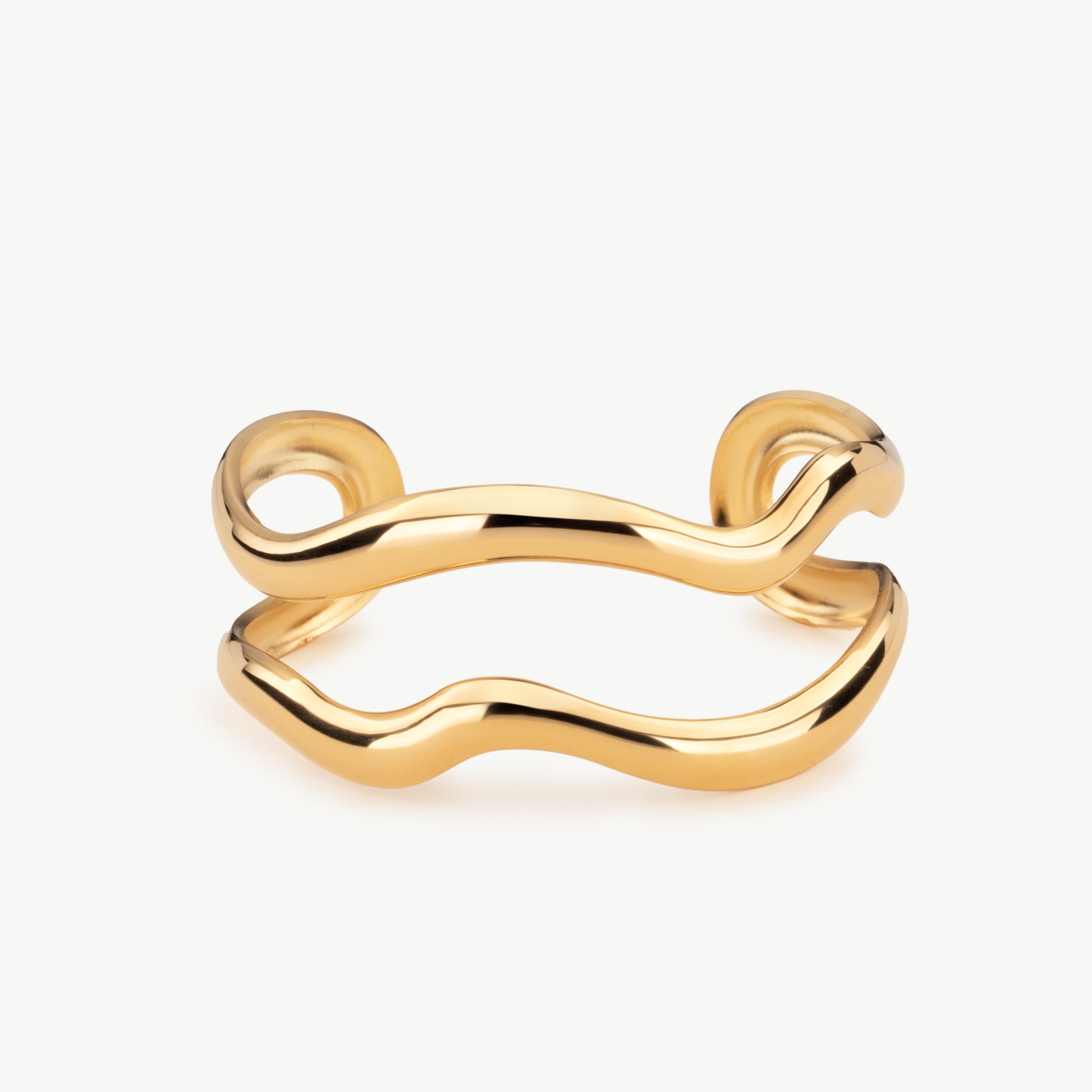 wavy bangle sculptural wavy gold bangle bracelet with flowing wave design inspired by ocean themed jewelry and modern gold cuff bracelet styling wide gold cuff