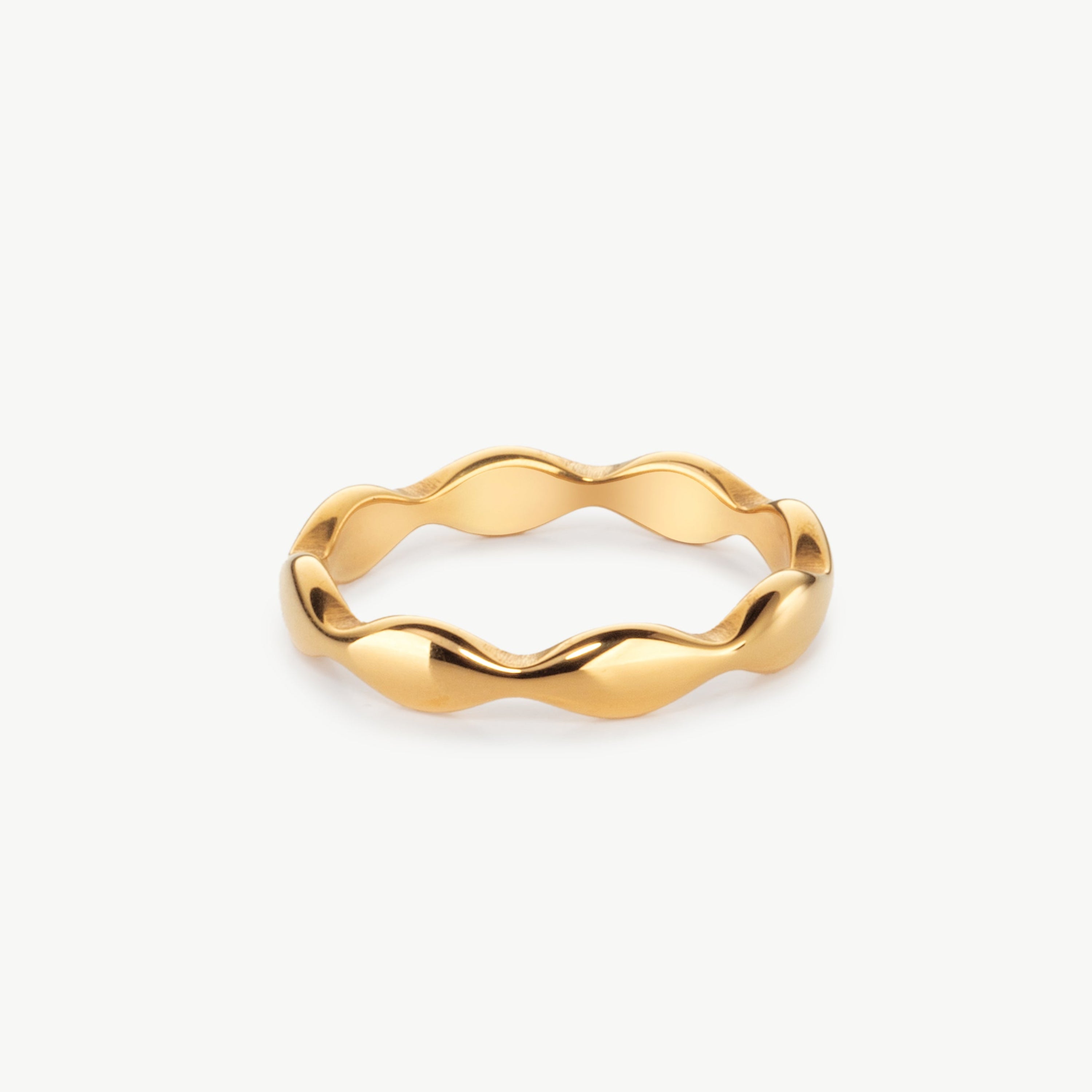wavy ring band in gold with curved flowing shape, gold wavy ring band with ripple ring detail and minimalist polished finish